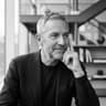 Monochrome close-up portrait of a former VP of technology at a luxury retail brand.